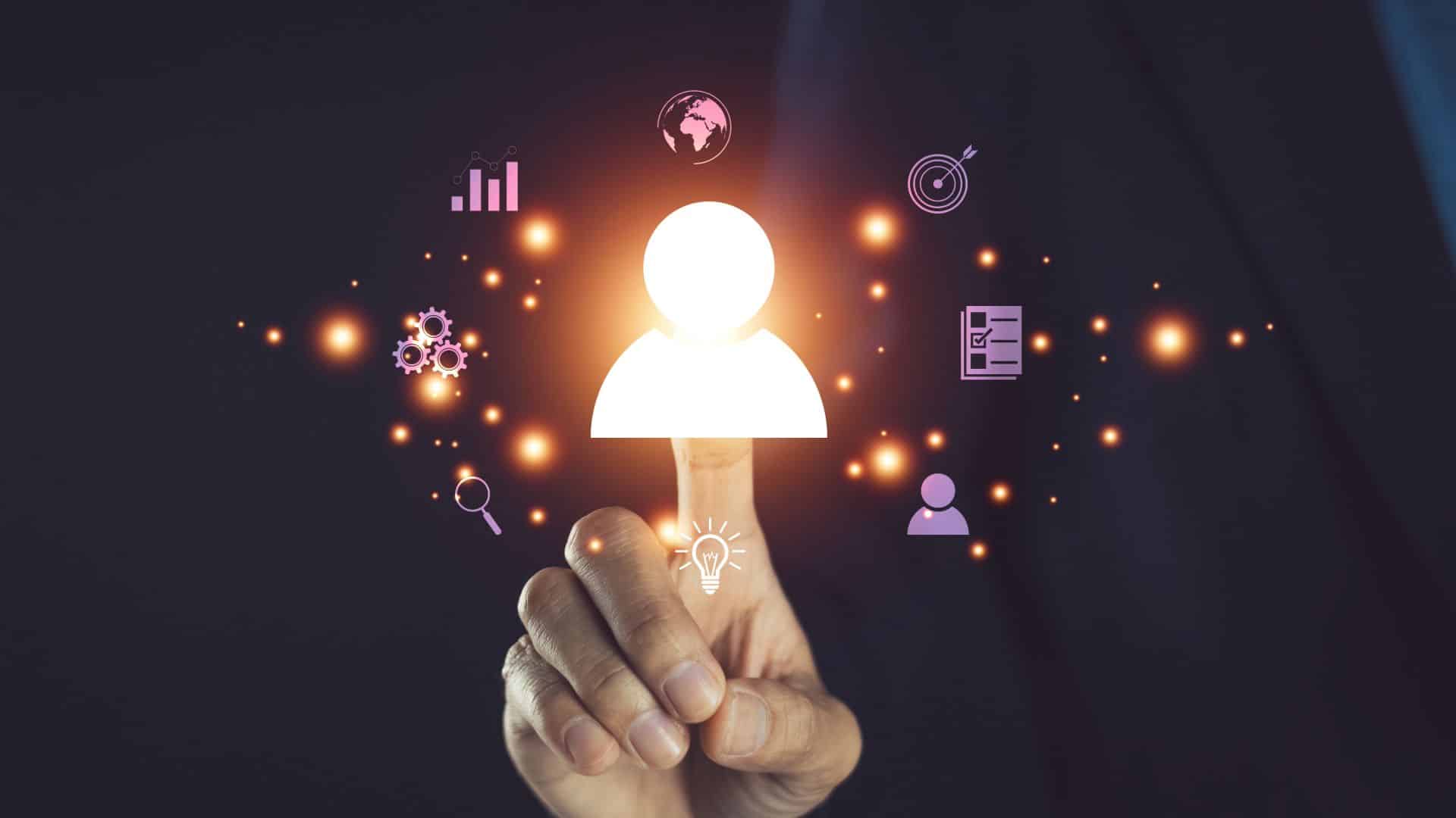 Une main pointe vers une icône d'utilisateur lumineuse entourée de symboles data marketing pour illustrer une campagne de retargeting